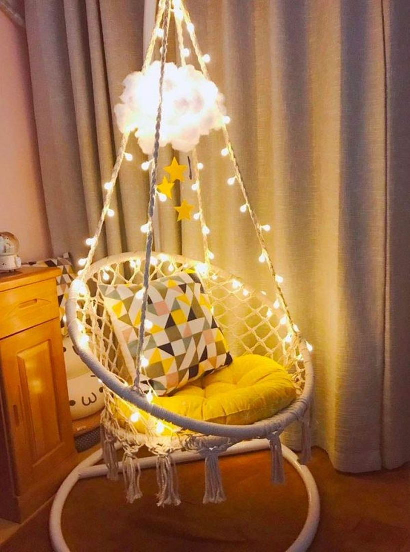 Hanging macrame chair with led lights.