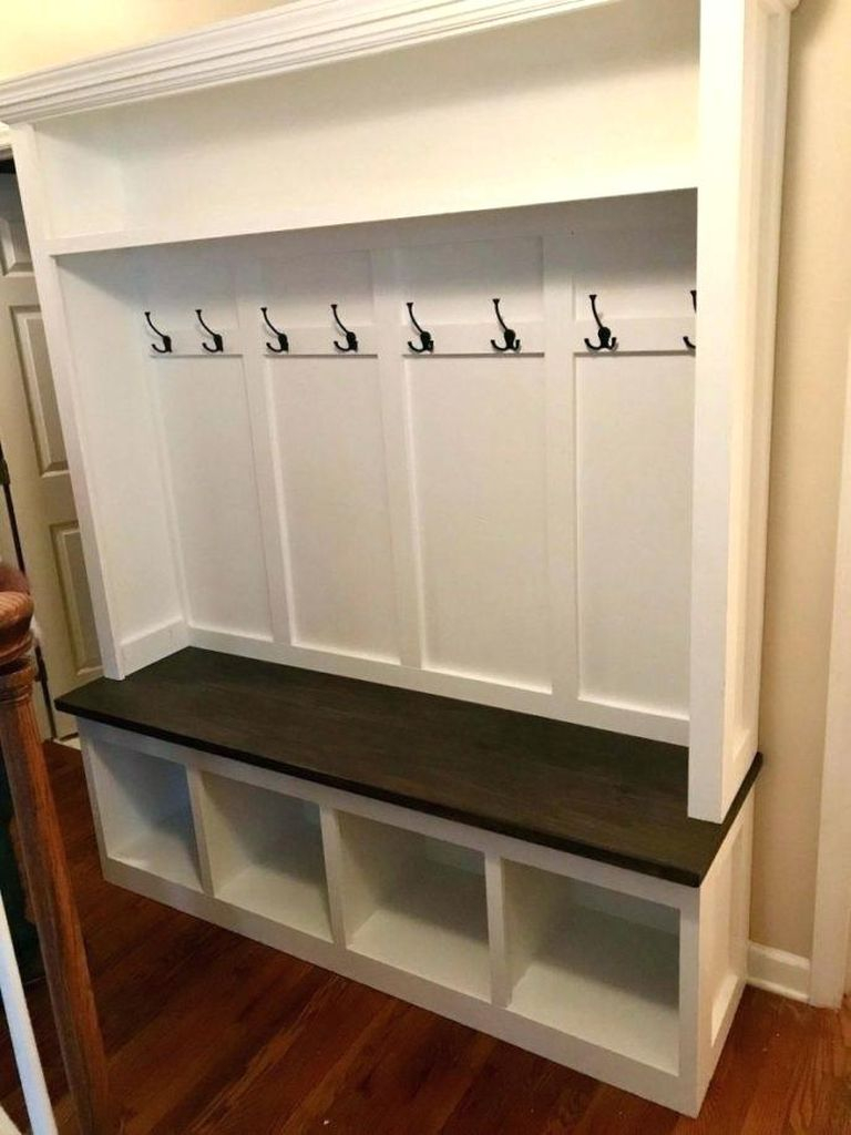 Modern entryway bench combined with hooks large size to save the coat after you wear it