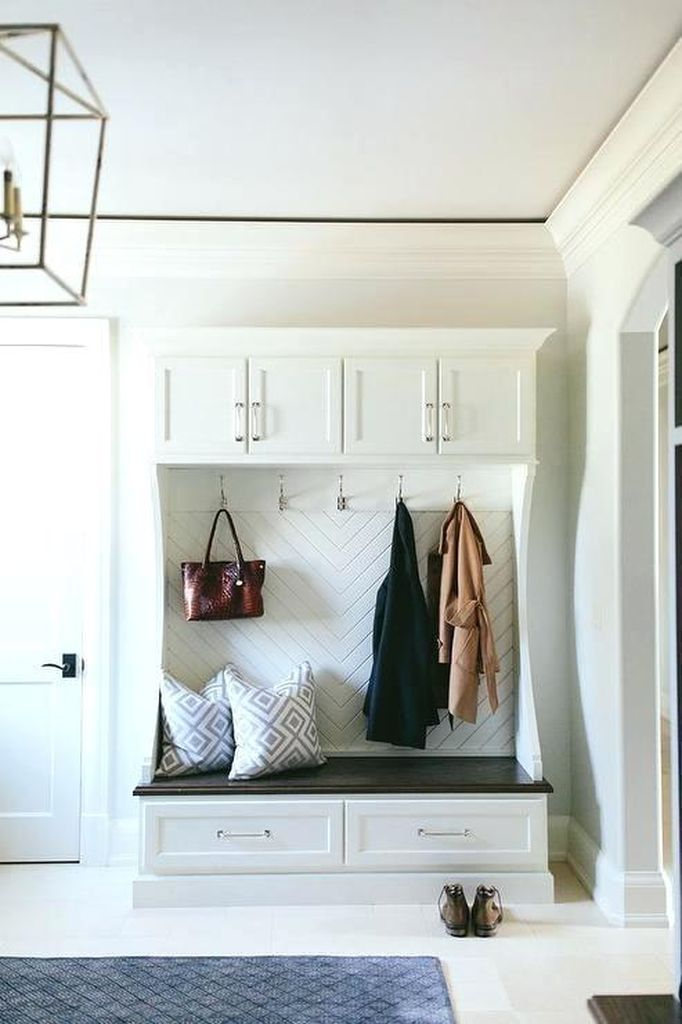 Modern entryway ideas with hooks to keep your bag and coat in your entryway