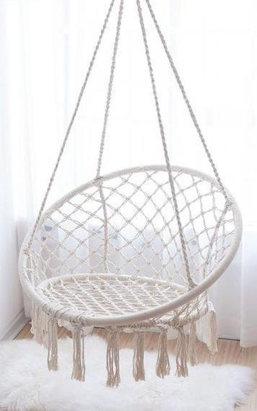 Modern hanging macrame chairs.