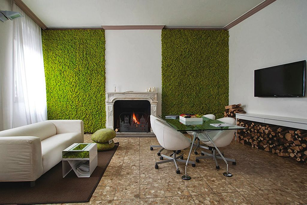Modern living design with white sofa, granite floor and white wall combined with moss on the wall to perfect your living room design