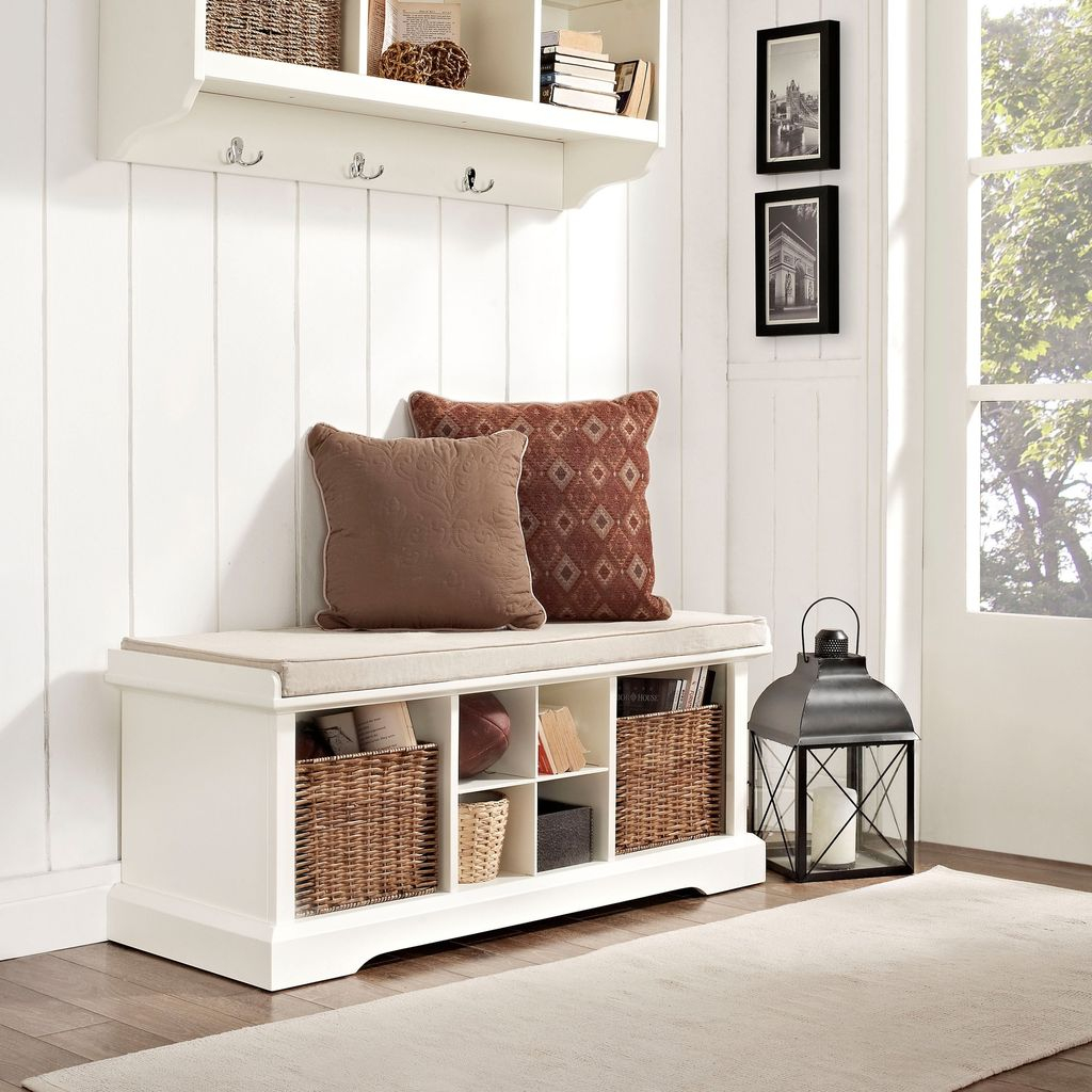 Modern wooden storage bench with storage basket below it and cushion to perfect your entryway decor