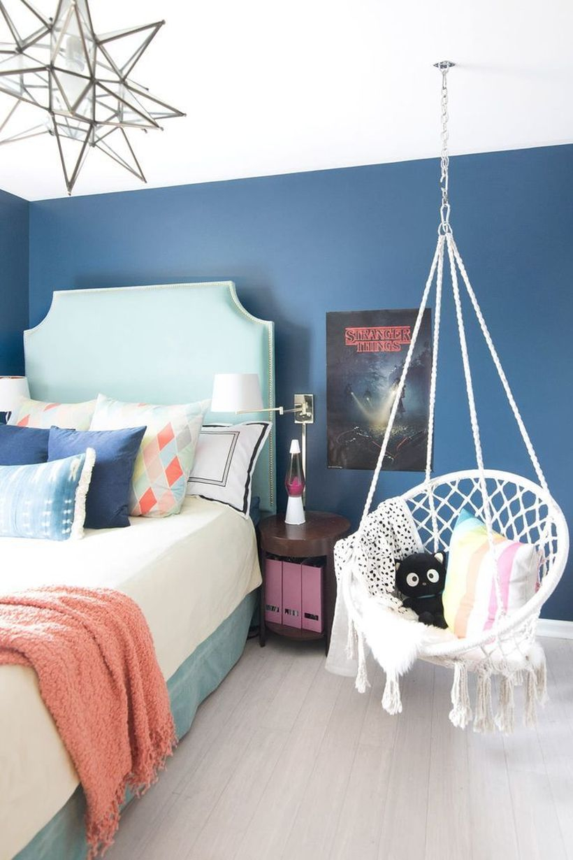 Neutral hanging macrame chair.