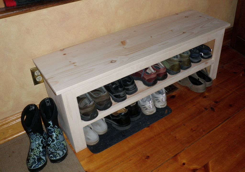 Simple wooden storage bench with shelf underneath to store your shoes