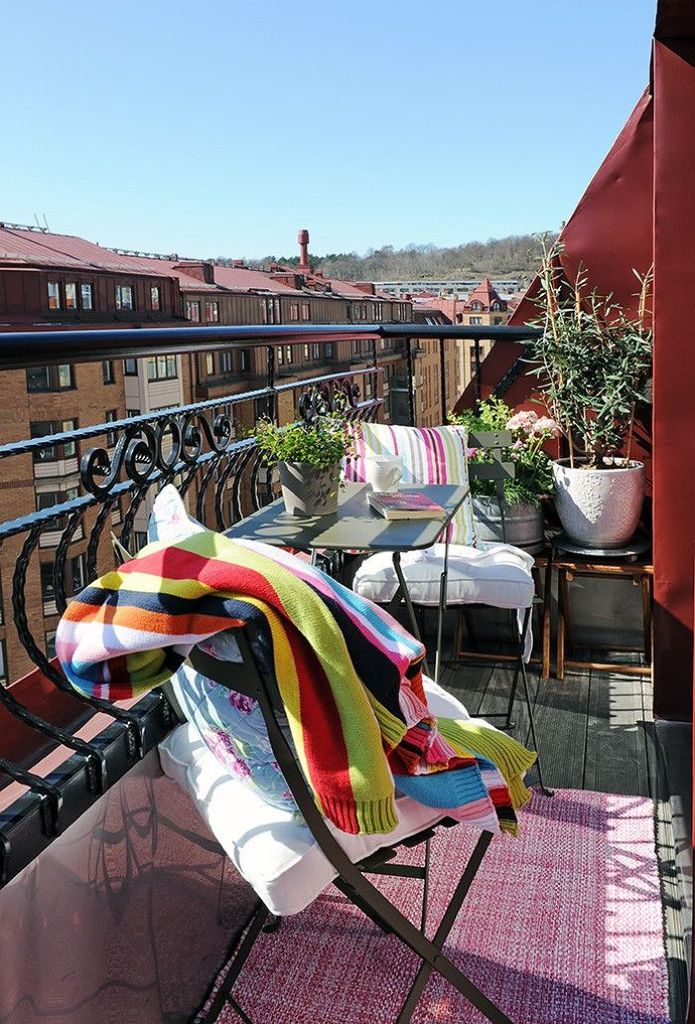 Small balcony with iron chair