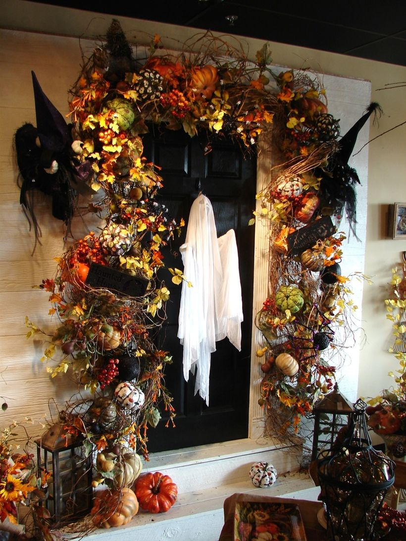 Spooky ghost halloween door decor.