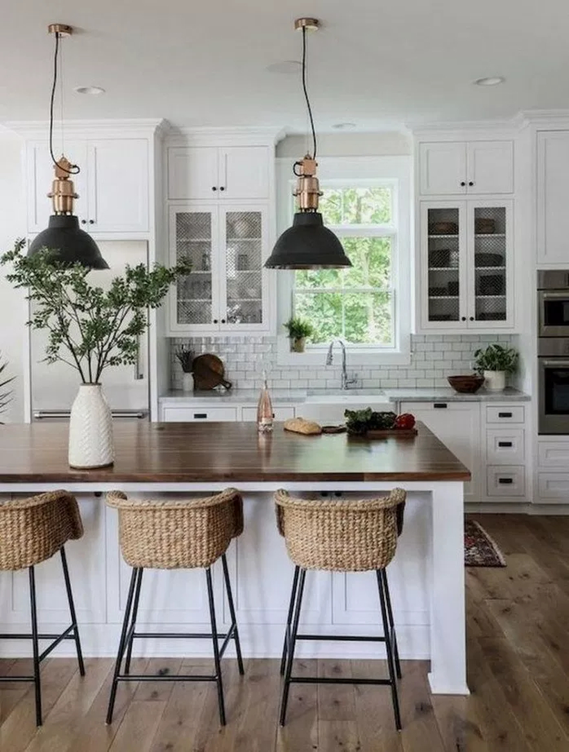 Square wooden countertop design with rattan chirs