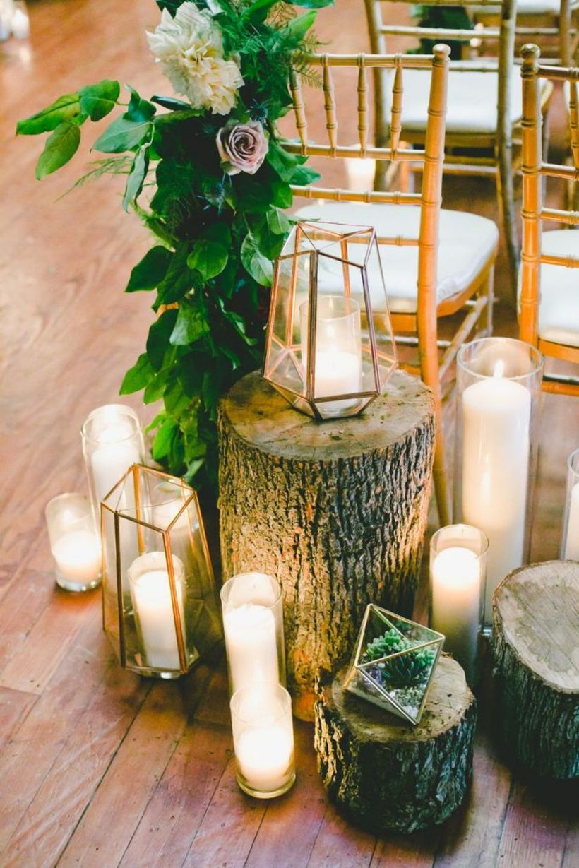 Stylish industrial geometric wedding decoration with candle holders to create a romantic atmosphere
