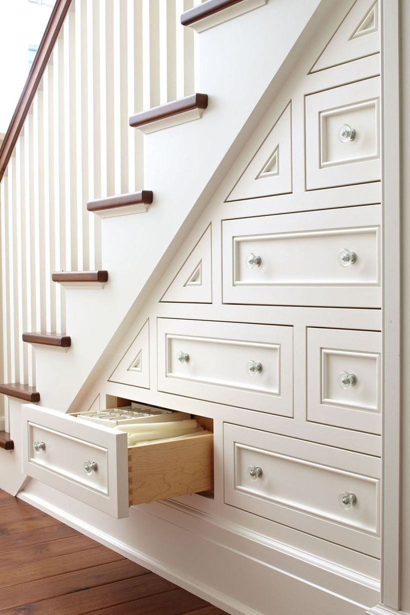 Utilize the area under the stairway.