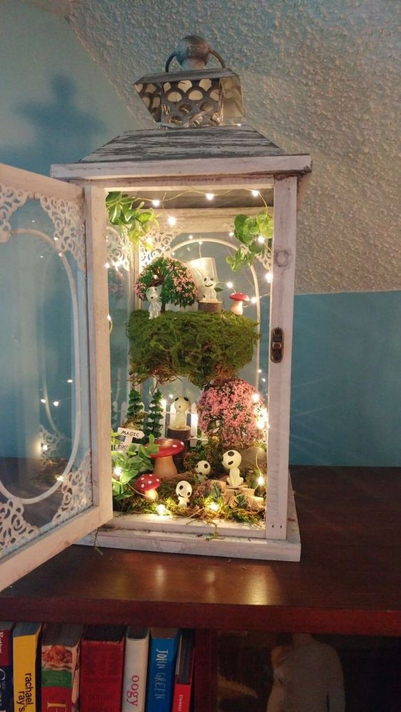 White lantern terrarium with decorative lighting to create beautify for your home