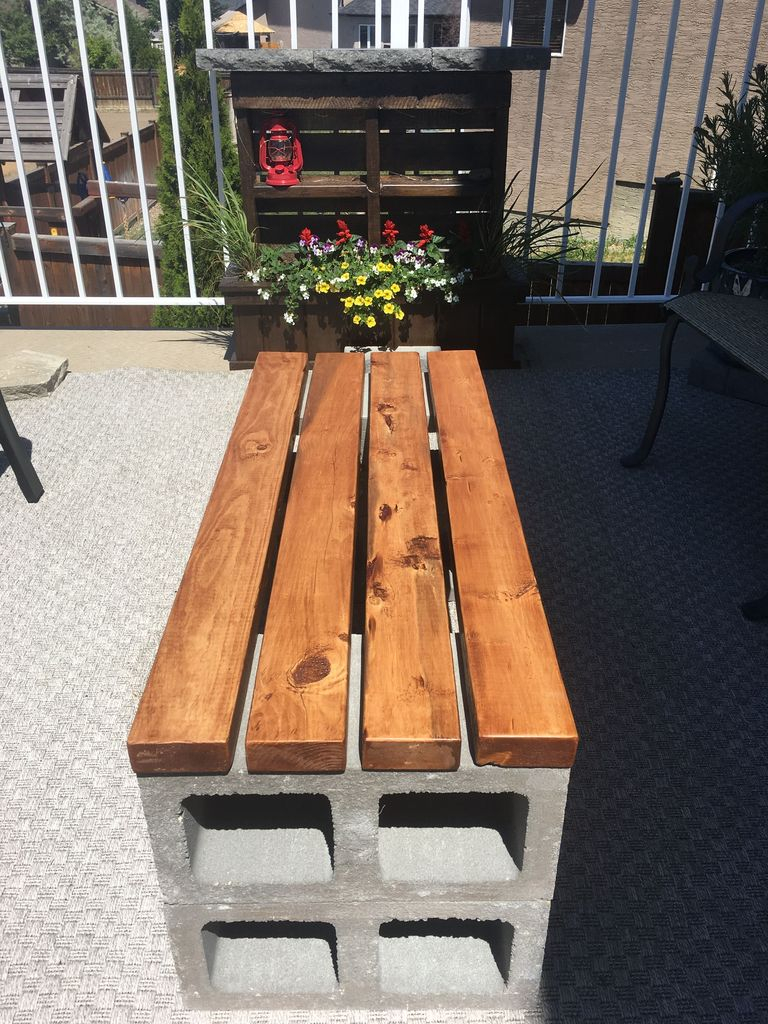 Wooden bench with brickwork stand