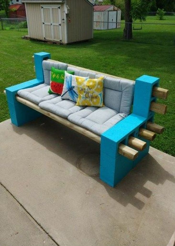 Wooden bench with patterned cushion