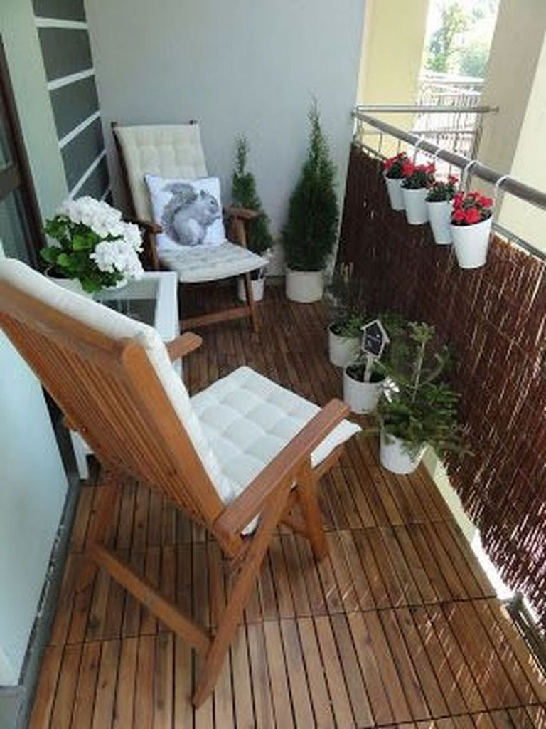 Wooden floor and wooden chair combined with plants decoration