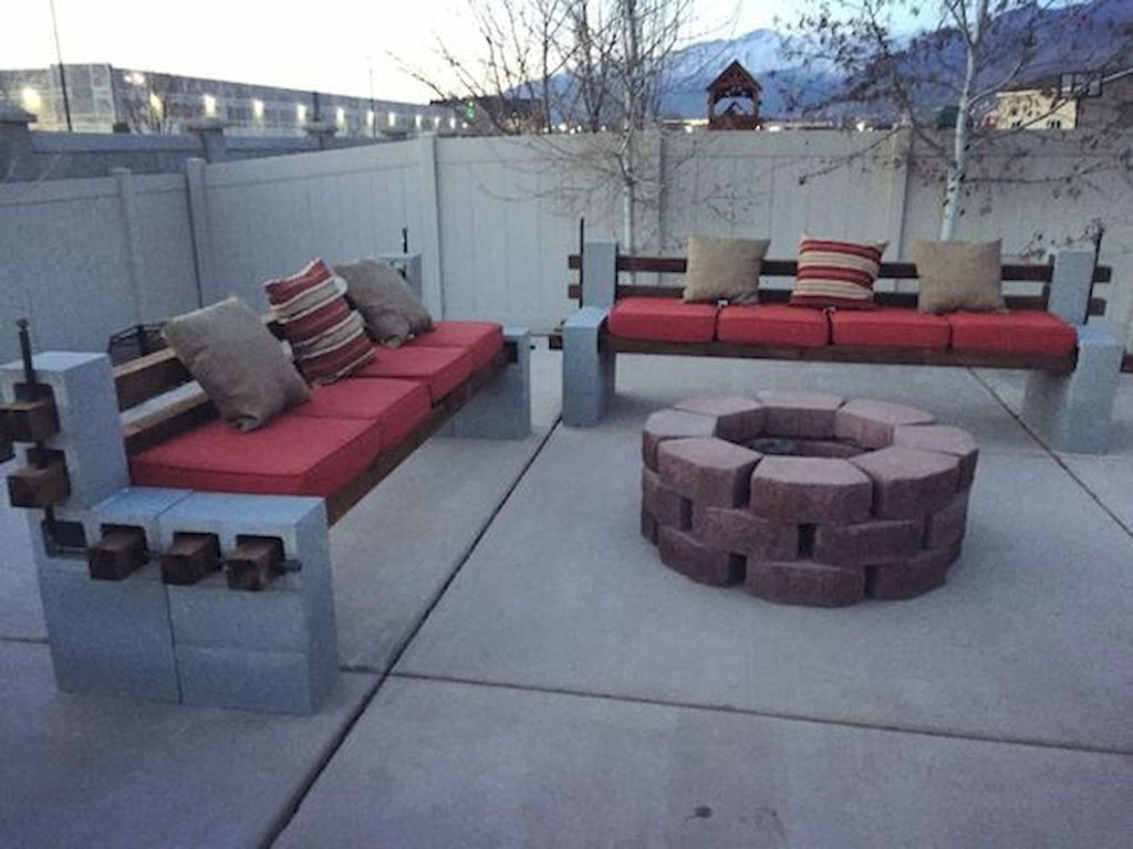 Wooden outdoor bench with fireplace