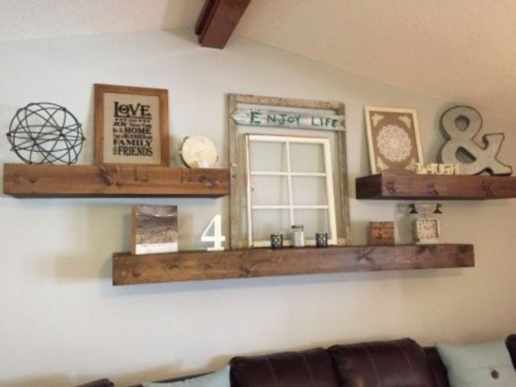Wooden shelves on the walls with iron decoration
