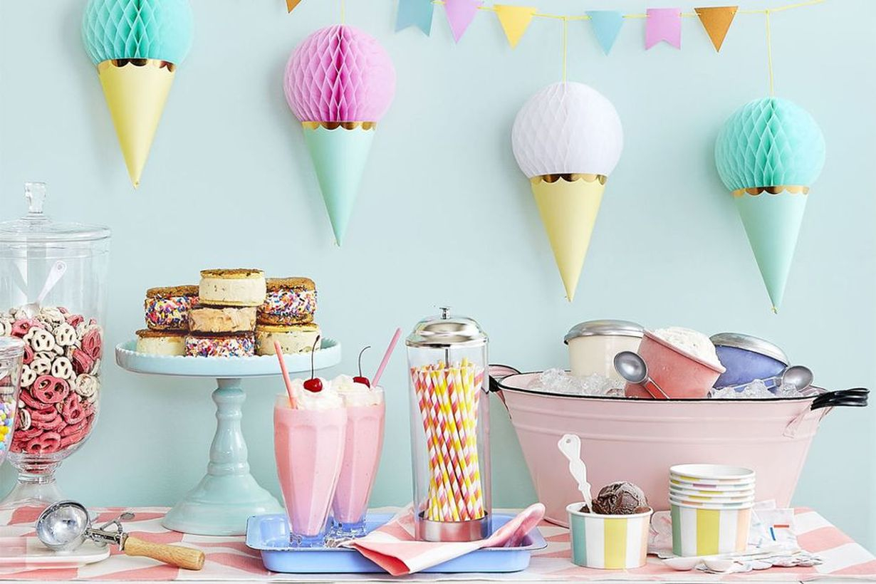 An interesting ornament birthday party decoration with ice cream garland pinned to the wall