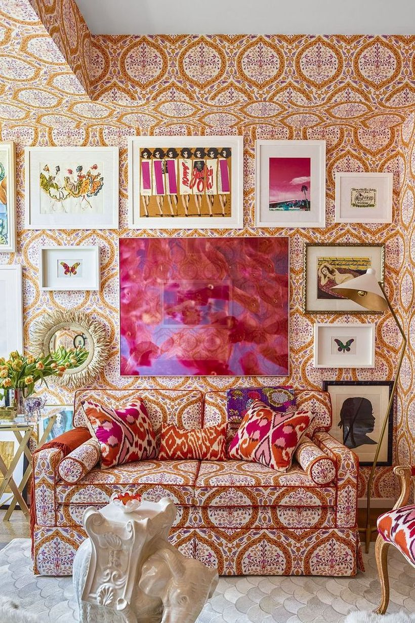 An elegant living room with fabric wallpaper design harmonious with the sofa