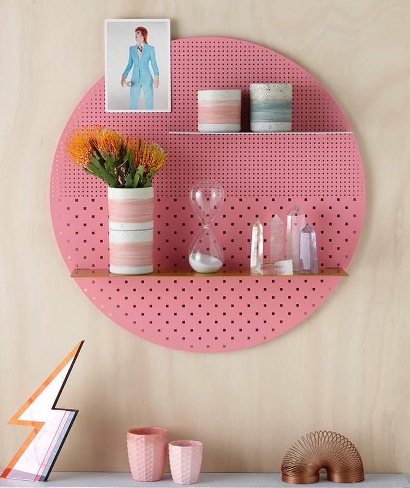 Creatife round pegboard shelves to put some small ornament to create a cozy room