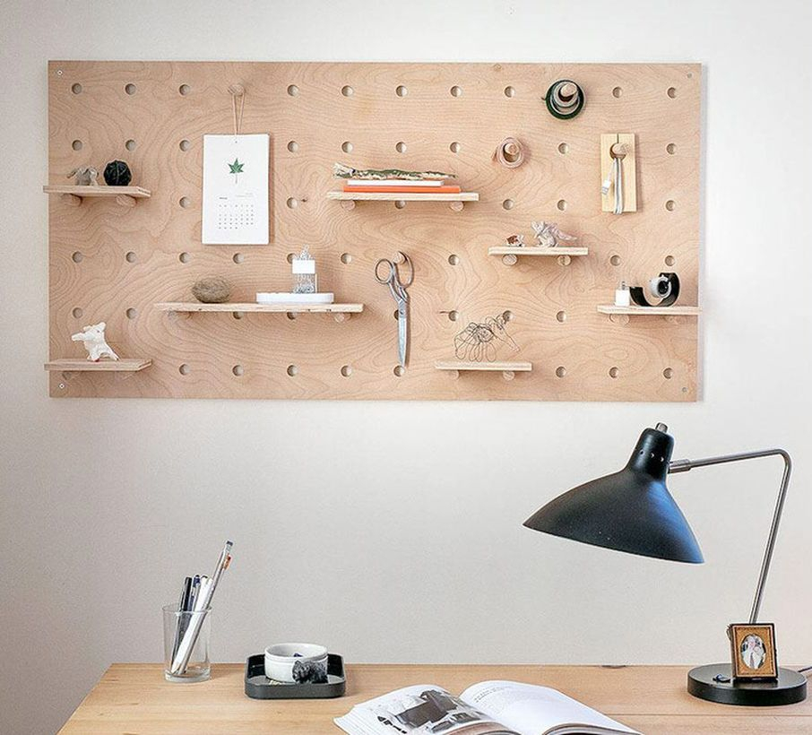 Creative pegboard shelves would be perfect for your home office desk to hang small ornament