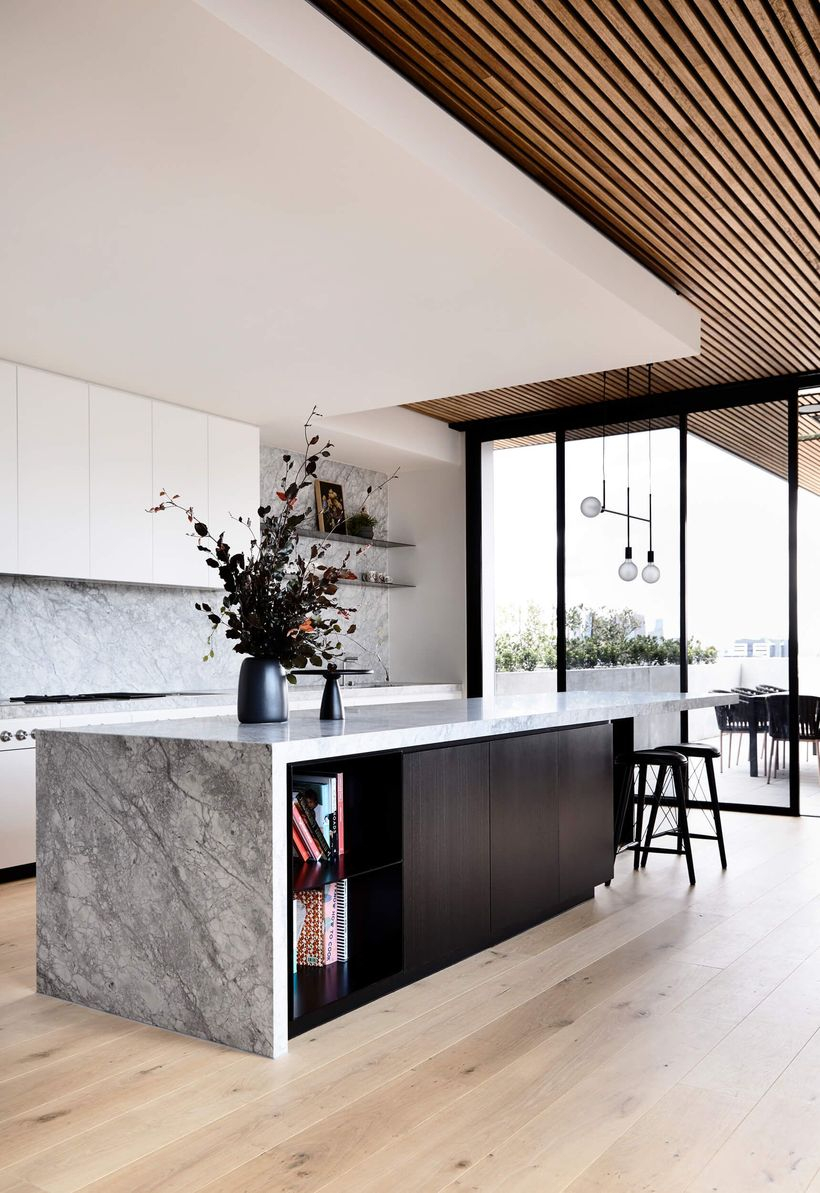 Long square gray countertop design on black cabinet