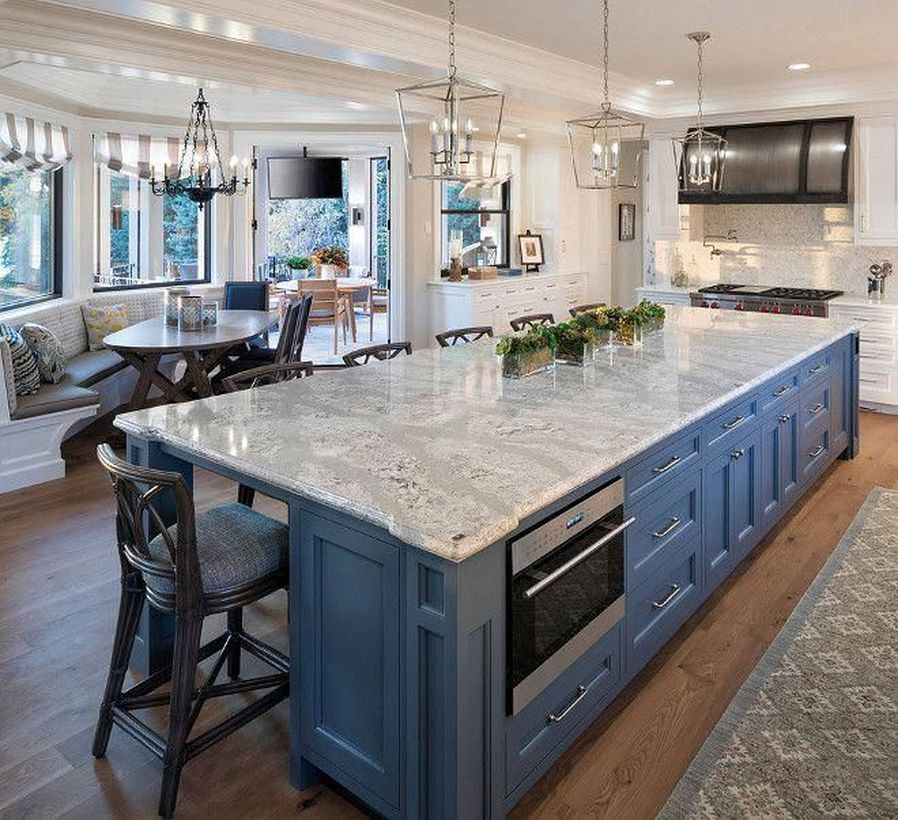 Long white countertop design on blue cabinet