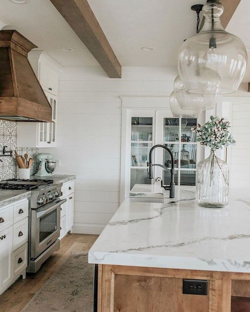 Long white countertop design with black sink