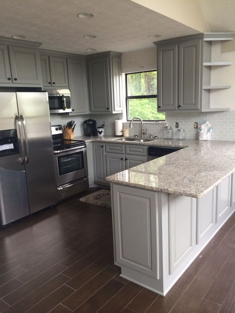 Marble countertop design on white wooden cabinet