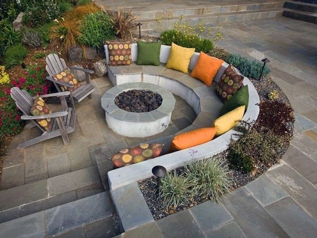 Outdoor fire pit with sofa cushions