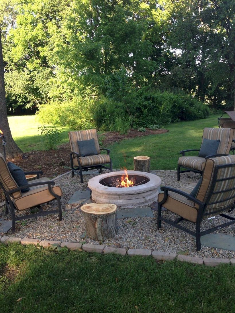 Round fire pit with rustic chair