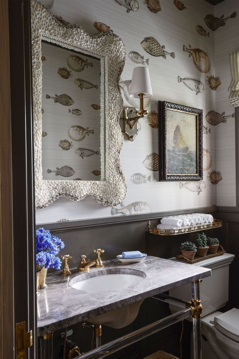 Simple small bathroom with beach house wallpaper so that it displays a different atmosphere
