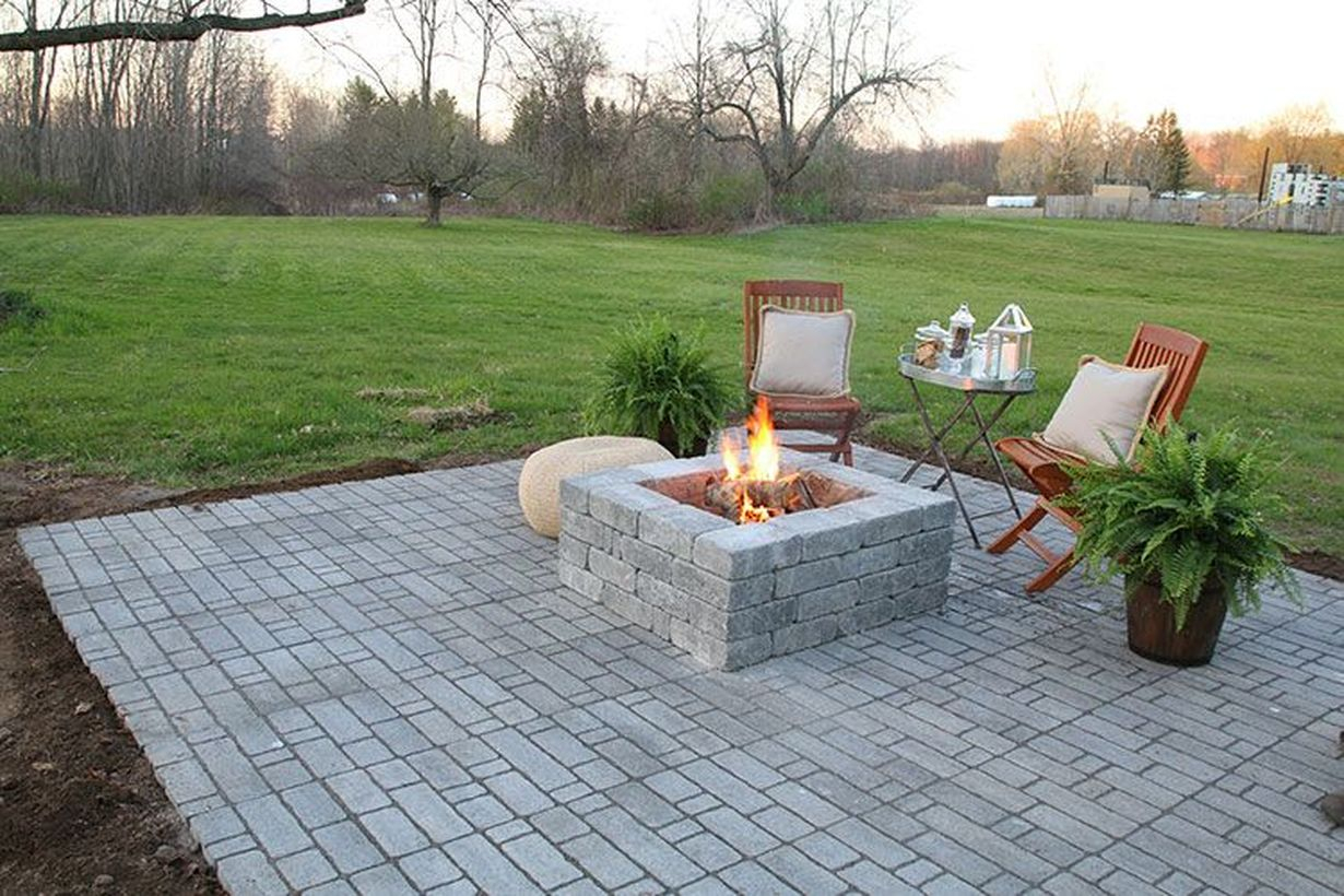 Square shaped fire pit with stones