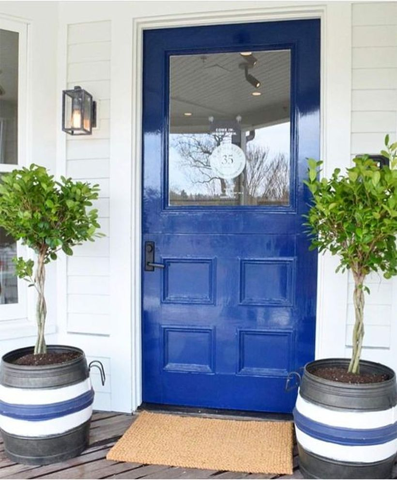 Striped planters with small trees for decoration front door you must try