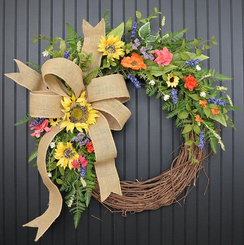 Stunning spring and summer wreath with burlap sack ribbons and sunflowers will provide a beautiful welcome to all who enter your home