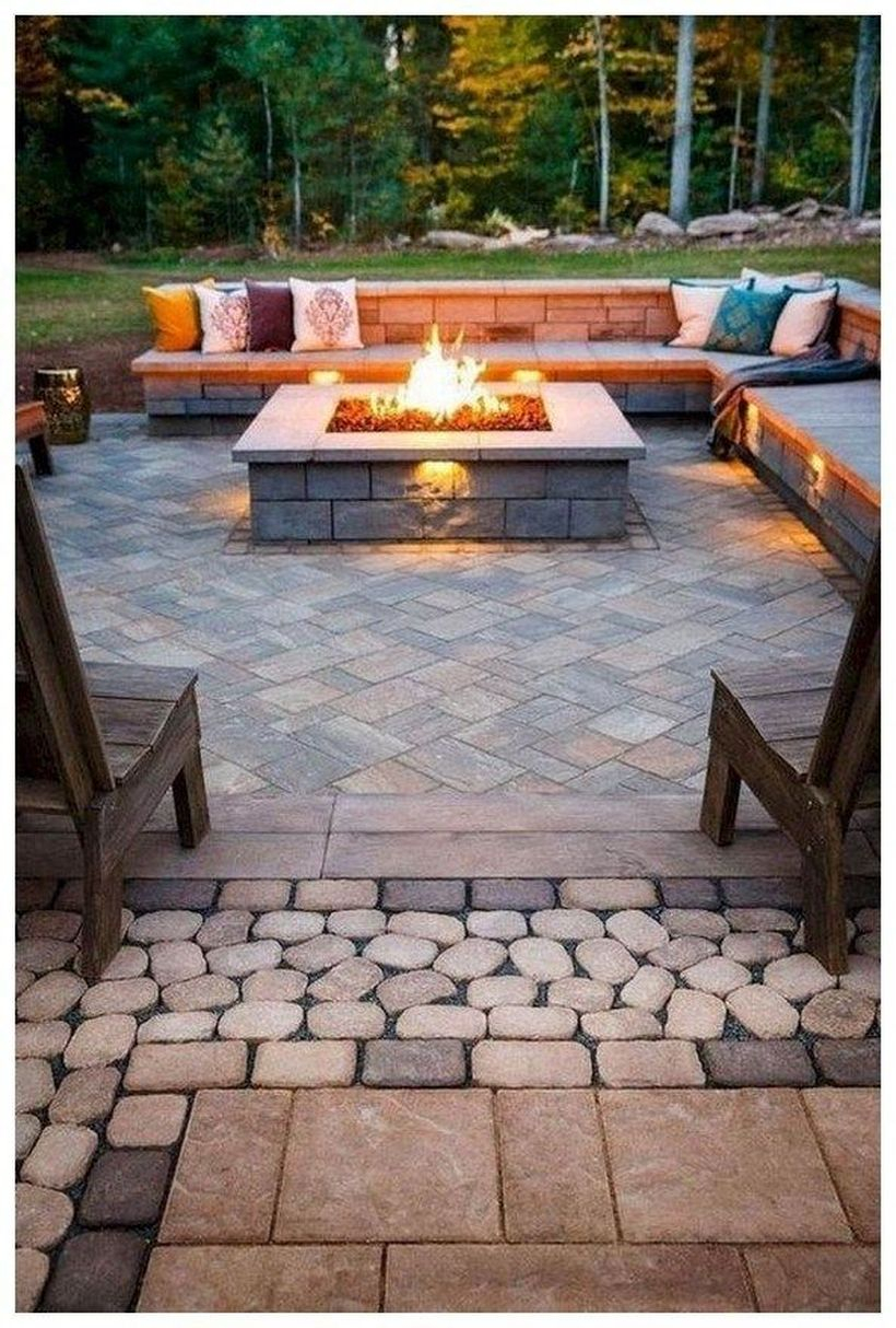 Stunning stone fire pit with l-shaped chair