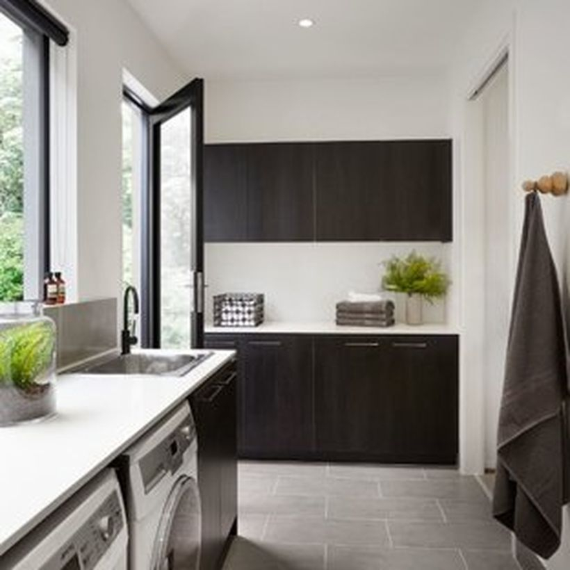 Washing machine with black cabinet storage