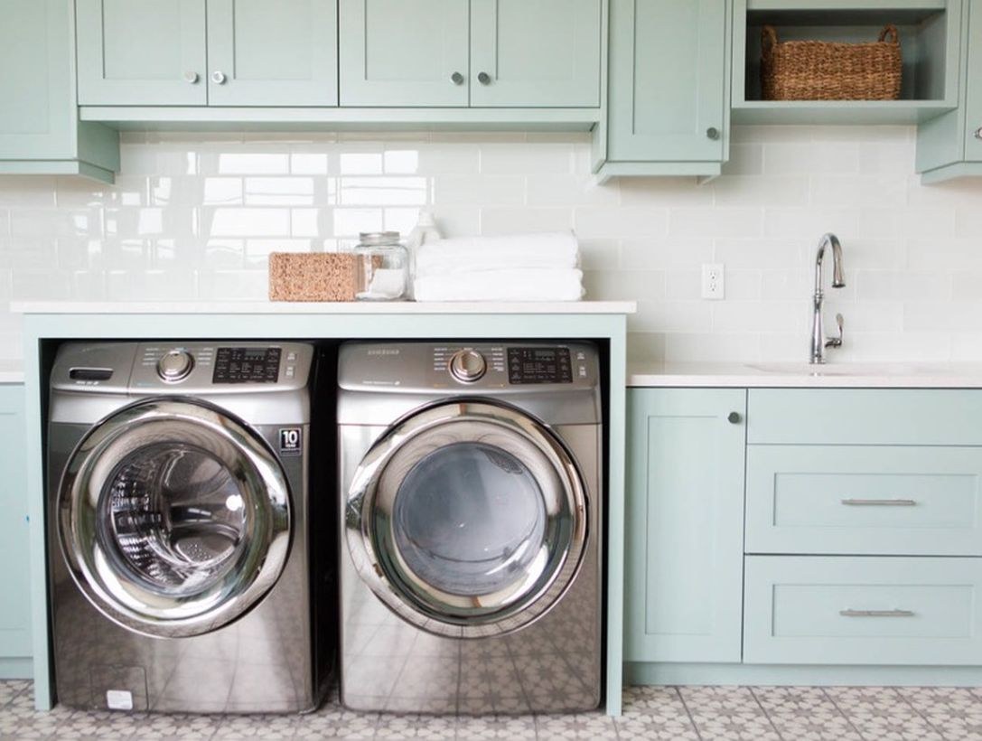 Washing machine with green wooden storage and rattan storage