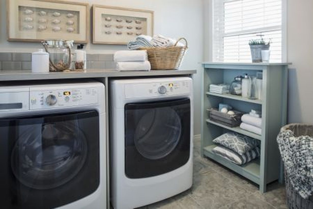 Washing machine with green wooden storage