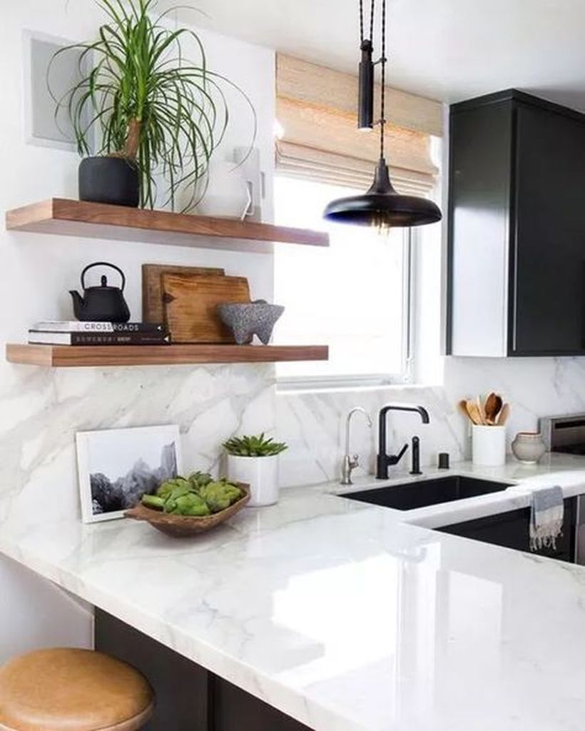 White countertop design with black and white sink