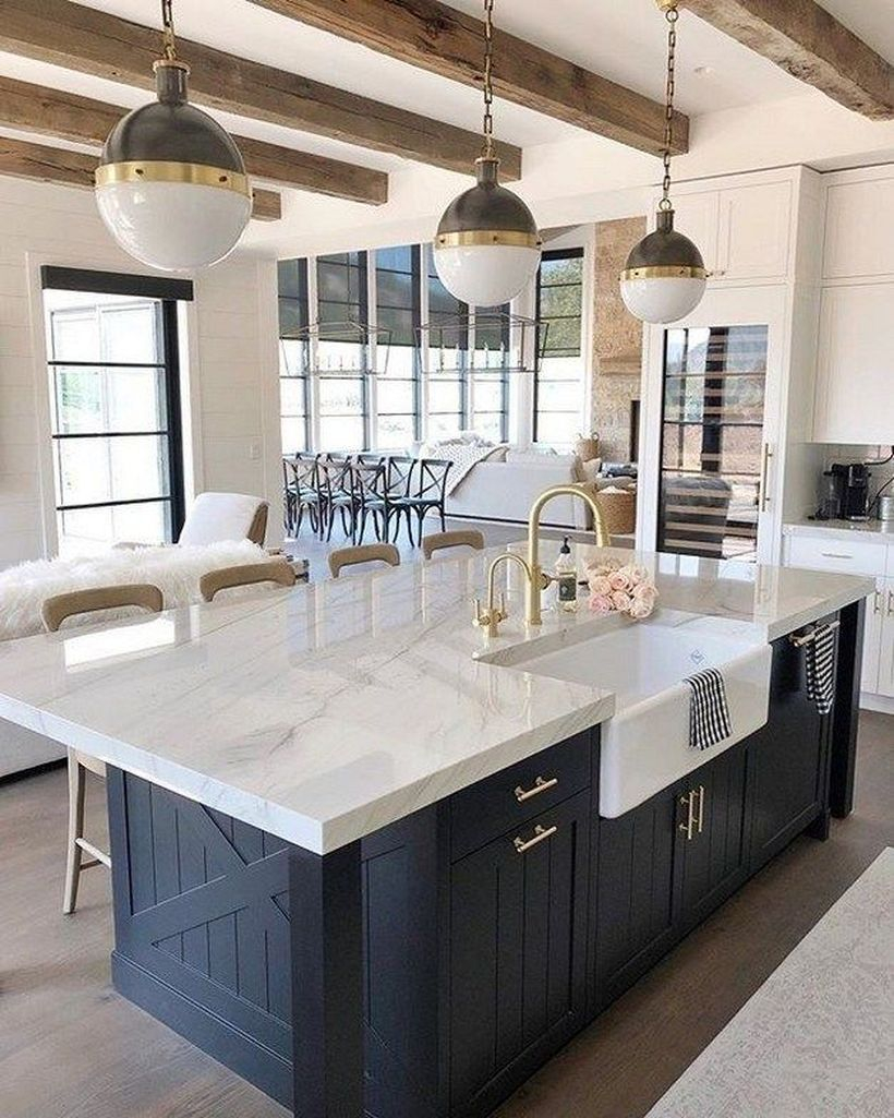 White marble countertop design on blue wooden cabinet