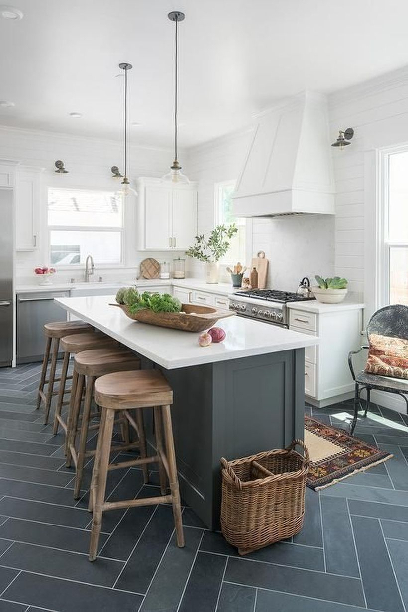 White marble countertop design white wooden chairs