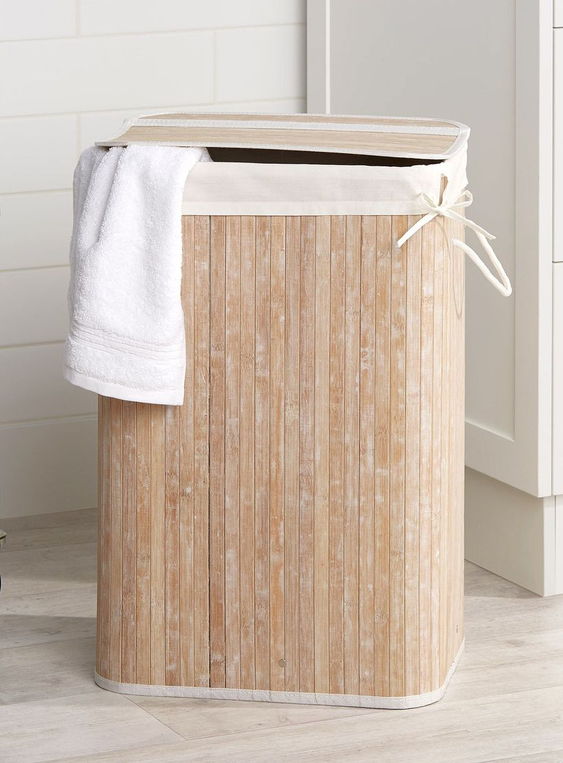 Wooden basket to store dirty clothes