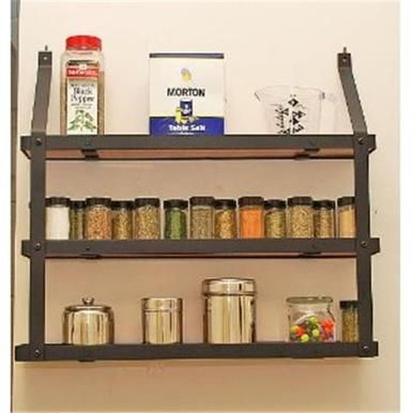 Wooden spice rack on the wall