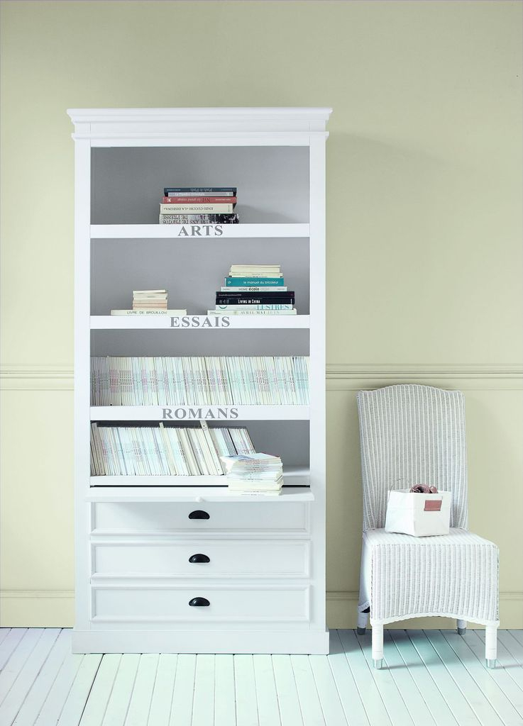 An amazing book storage ideas for a small bedroom with a labelled bookcase in white to perfect your bedroom