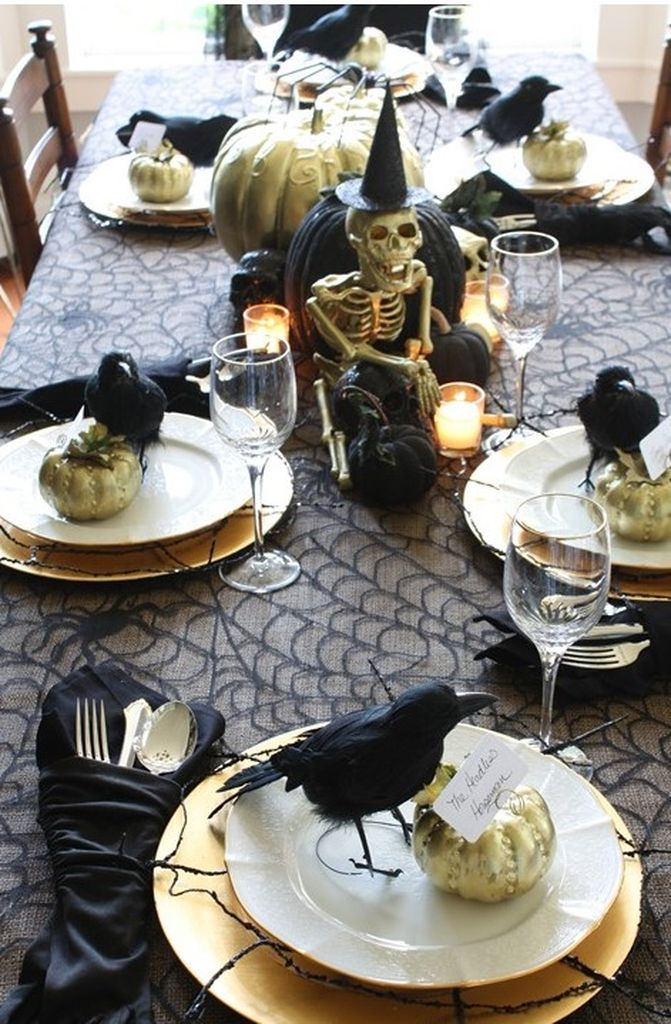 An incredible indoor decorations for halloween in dining room with skull in the middle to complete your decoration