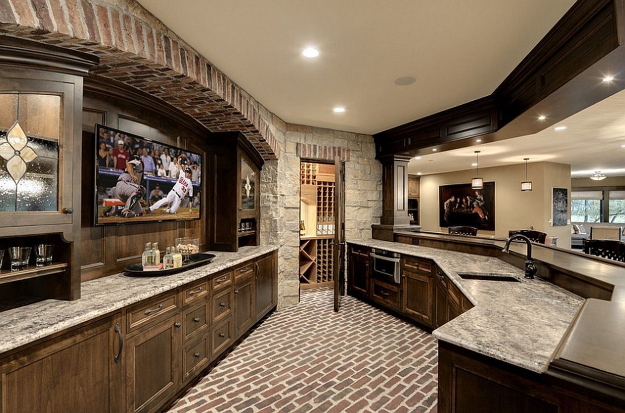 Basement with white bar and modern lighting