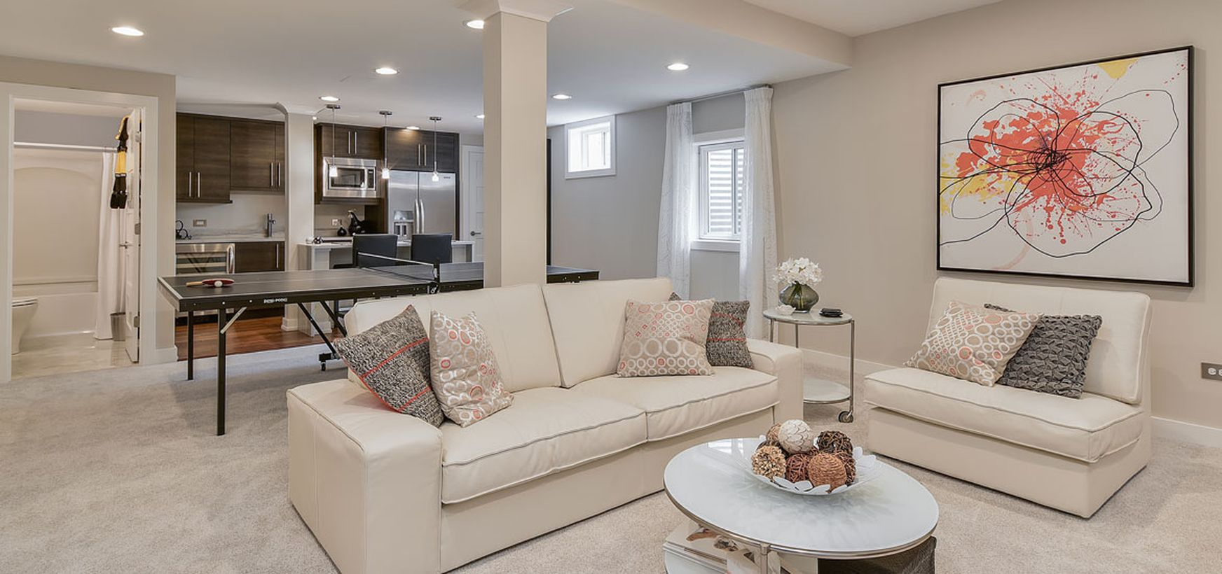 Basement with white latter l sofa and bar decoration