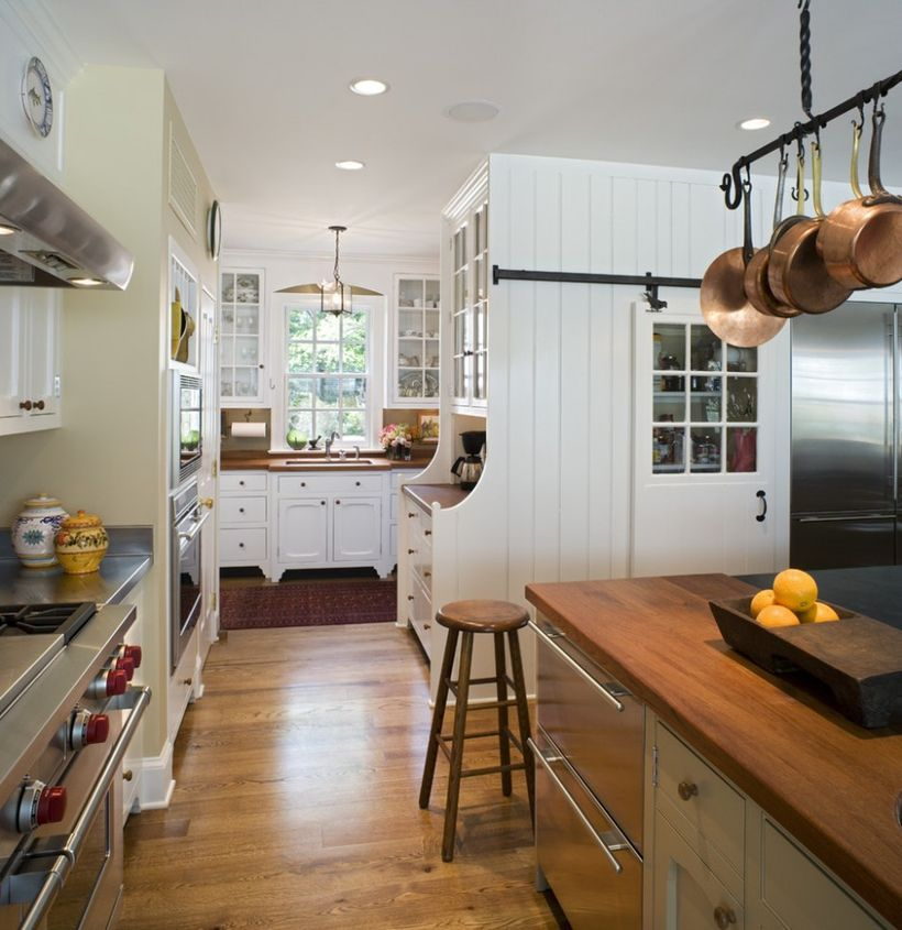 Best wooden kitchen flooring with white cabinet, wooden island table and small wooden chair