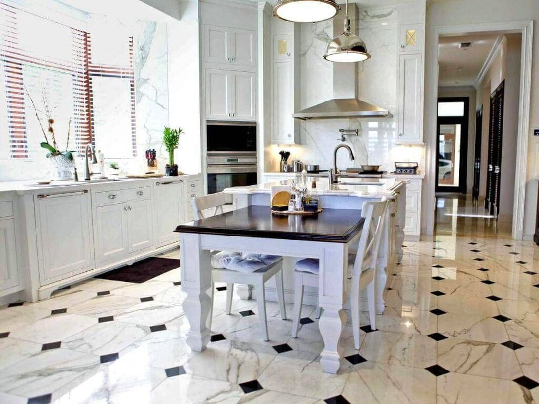 Black and white patterned kitchen floor with white wood cabinet and white wood island table ideas