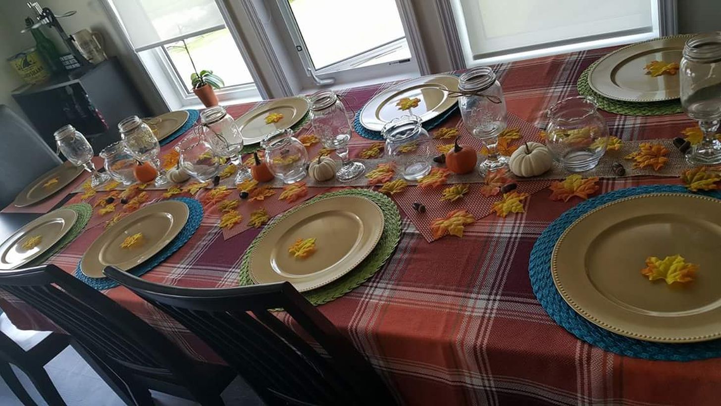 Checked-table-cloth-with-minimal-decoration-for-thanksgiving-dining.-