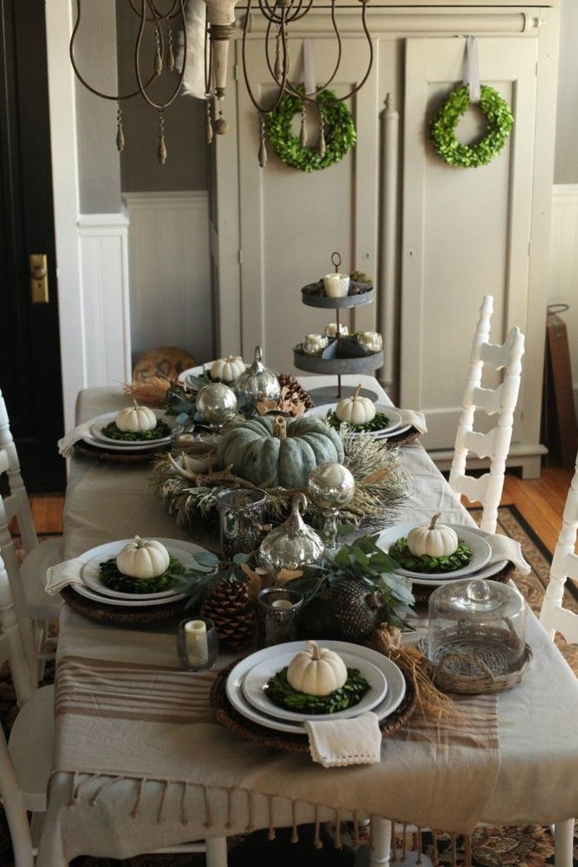 Dark-green-pumpkin-and-gray-tablecloth-for-thanksgiving-dinner.-